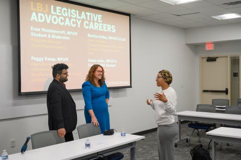 Maritza and Awais talk with a student after the panel.