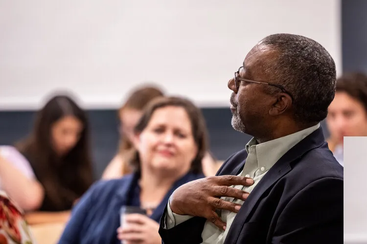 Gregory Smith speaking in the panel