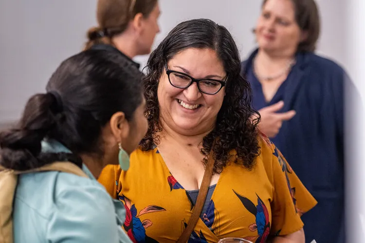 Gabby talking to an attendee