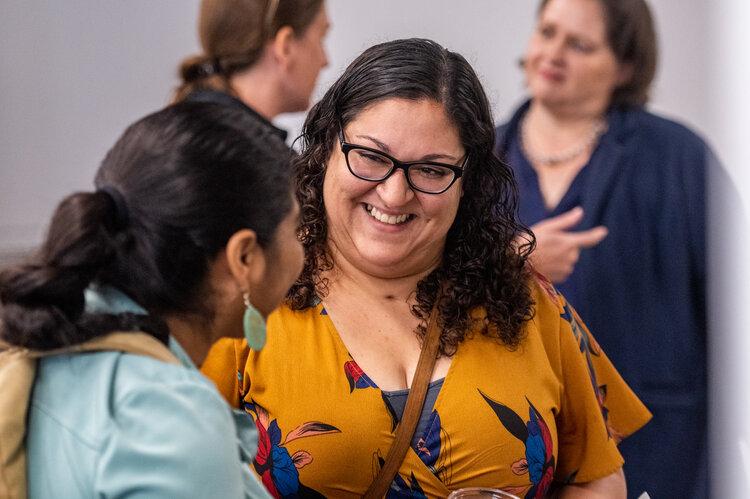 Gabby talking to an attendee